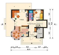Красивый загородный особняк с эркерами и мансардным этажом